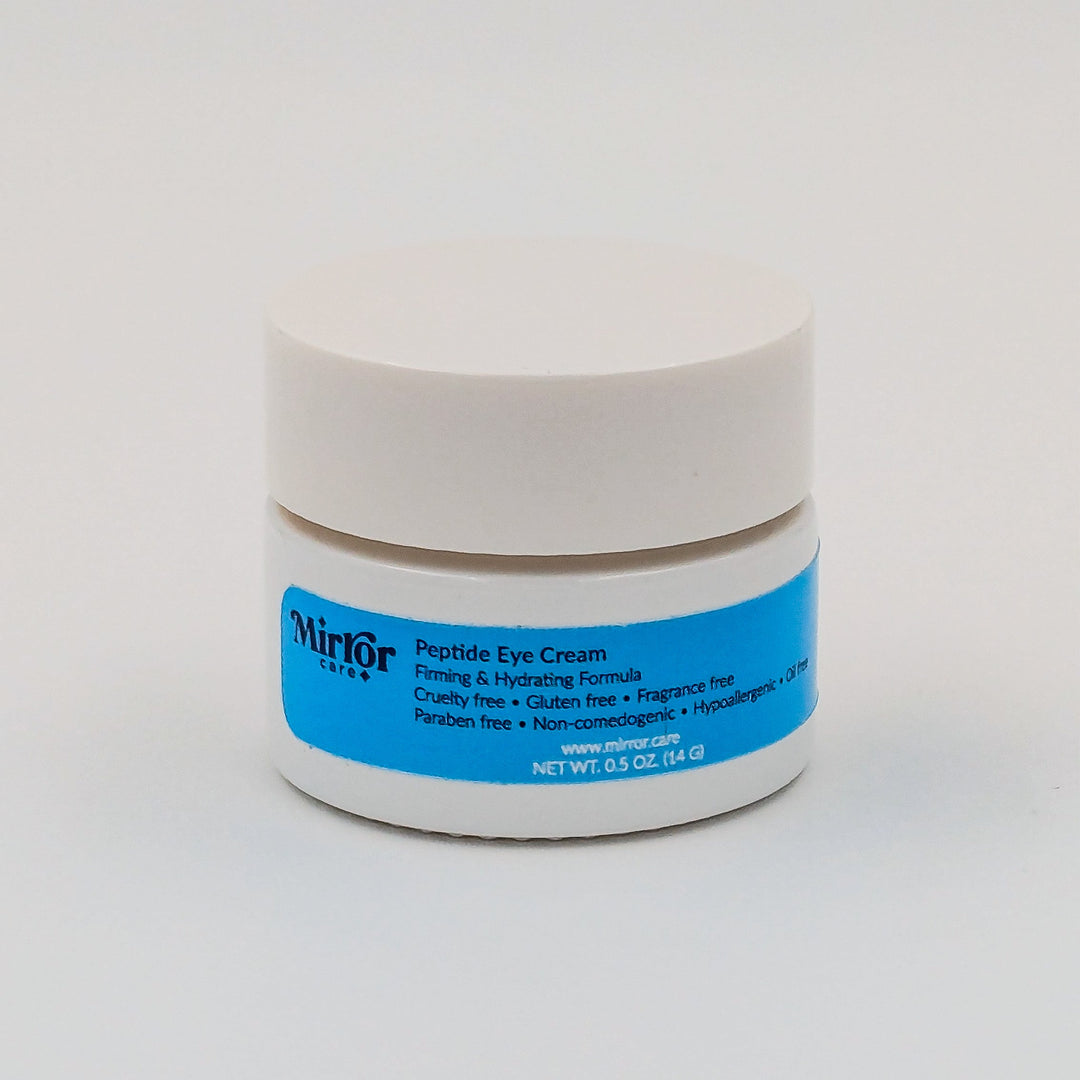 A container of Peptide Eye Cream with Mirror Care blue label against a white background.